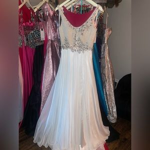 MacDuggal chiffon gown with Pearl design and open back. This gown is stunning!!